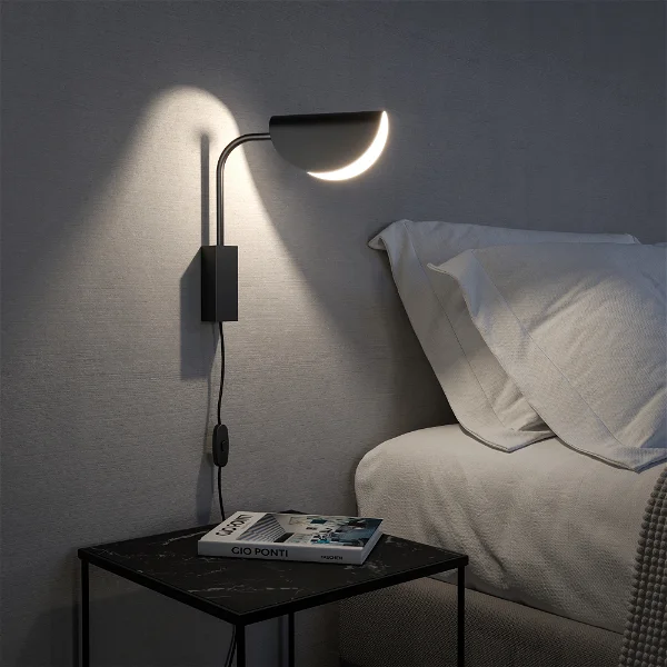 eine schwarze Design Wandleuchte 'Mollis' perfekt für das Schlafzimmer