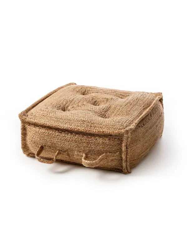 Square jute pouf with tufted details and handles for easy portability and natural charm.