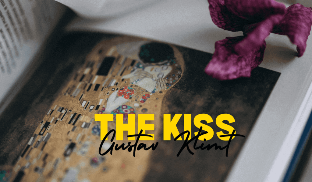 Der Kuss“ erschien in einem aufgeschlagenen Kunstbuch mit goldenen Mustern und floralen Motiven, einer violetten Blume auf der Seite und der Überschrift ‚GUSTAV KLIMT Der Kuss‘. Der Kuss“ erschien in einem aufgeschlagenen Kunstbuch mit goldenen Mustern und floralen Motiven, einer violetten Blume auf der Seite und der Überschrift ‚GUSTAV KLIMT Der Kuss‘.